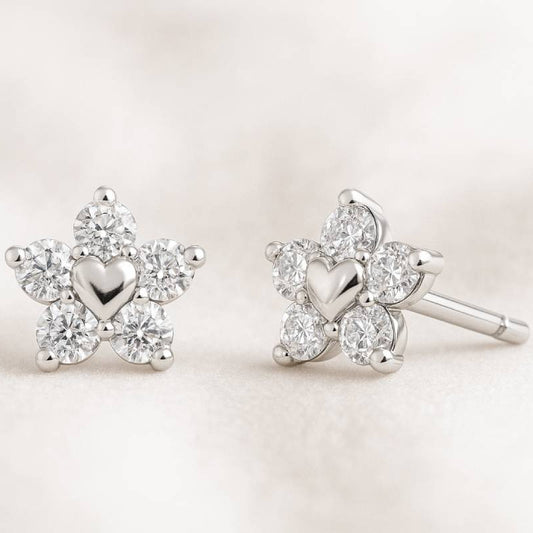 earrings with heart designs on a light background