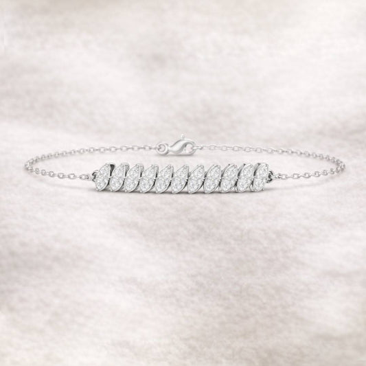 bracelet with leaf-shaped charms on a light gray background