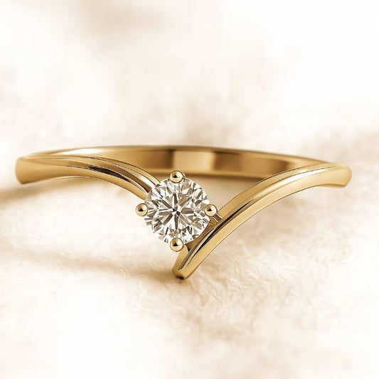 Gold ring with a diamond on a soft beige background