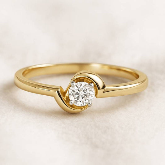 Gold ring with a diamond on a beige background
