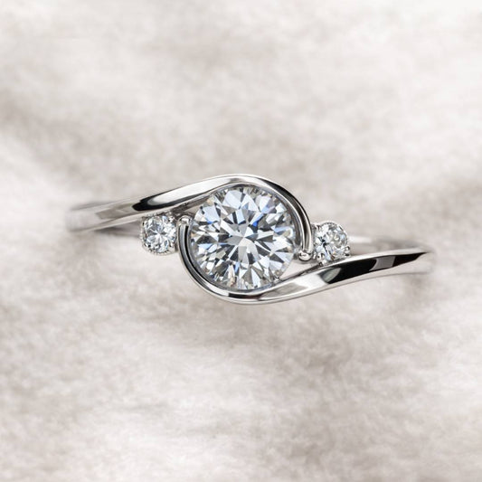 ring with a diamond on a soft white background
