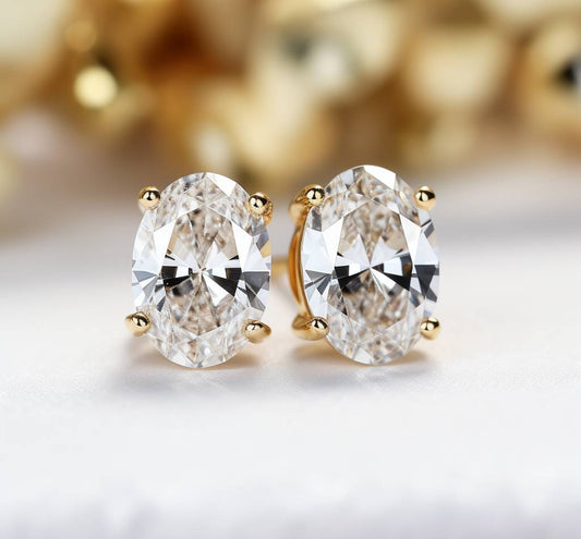 yellow gold oval diamond studs 