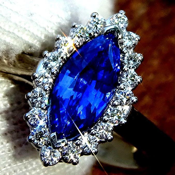 natural blue sapphire and 18 diamond ring - Shilat