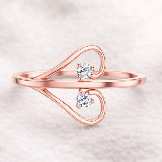 Two natural diamonds 0.10 carats in 14k rose gold ring