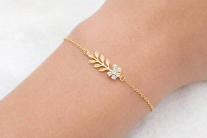 Gold bracelet with floral design