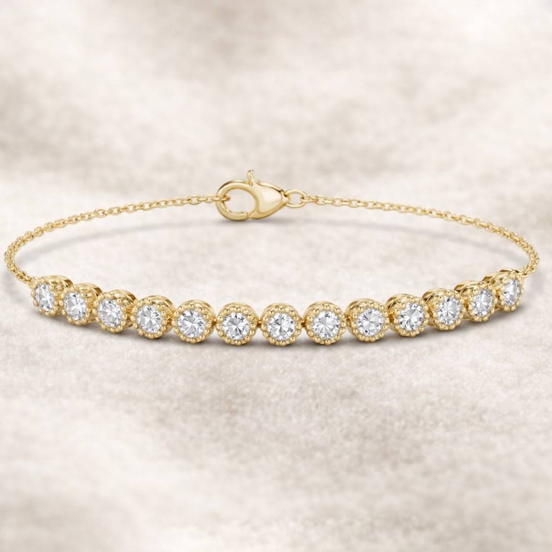 Gold bracelet with diamonds on a beige background