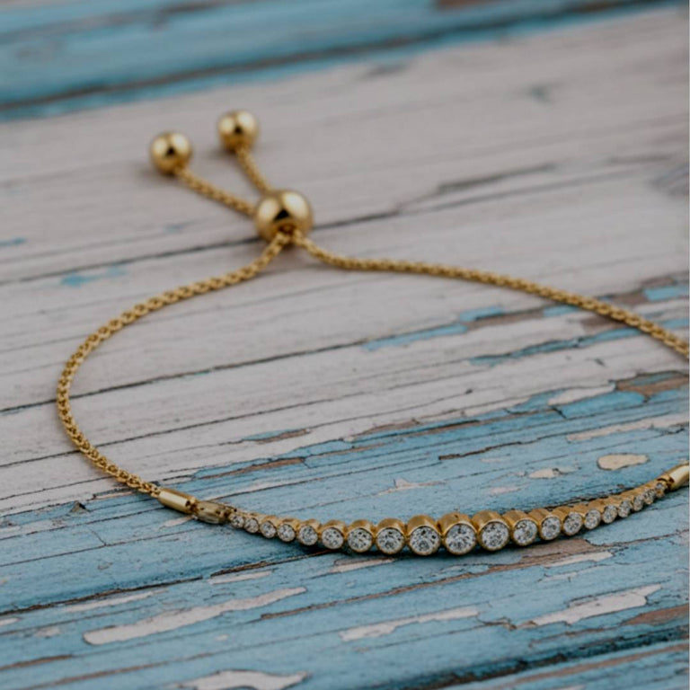 Gold bracelet with clear stones 