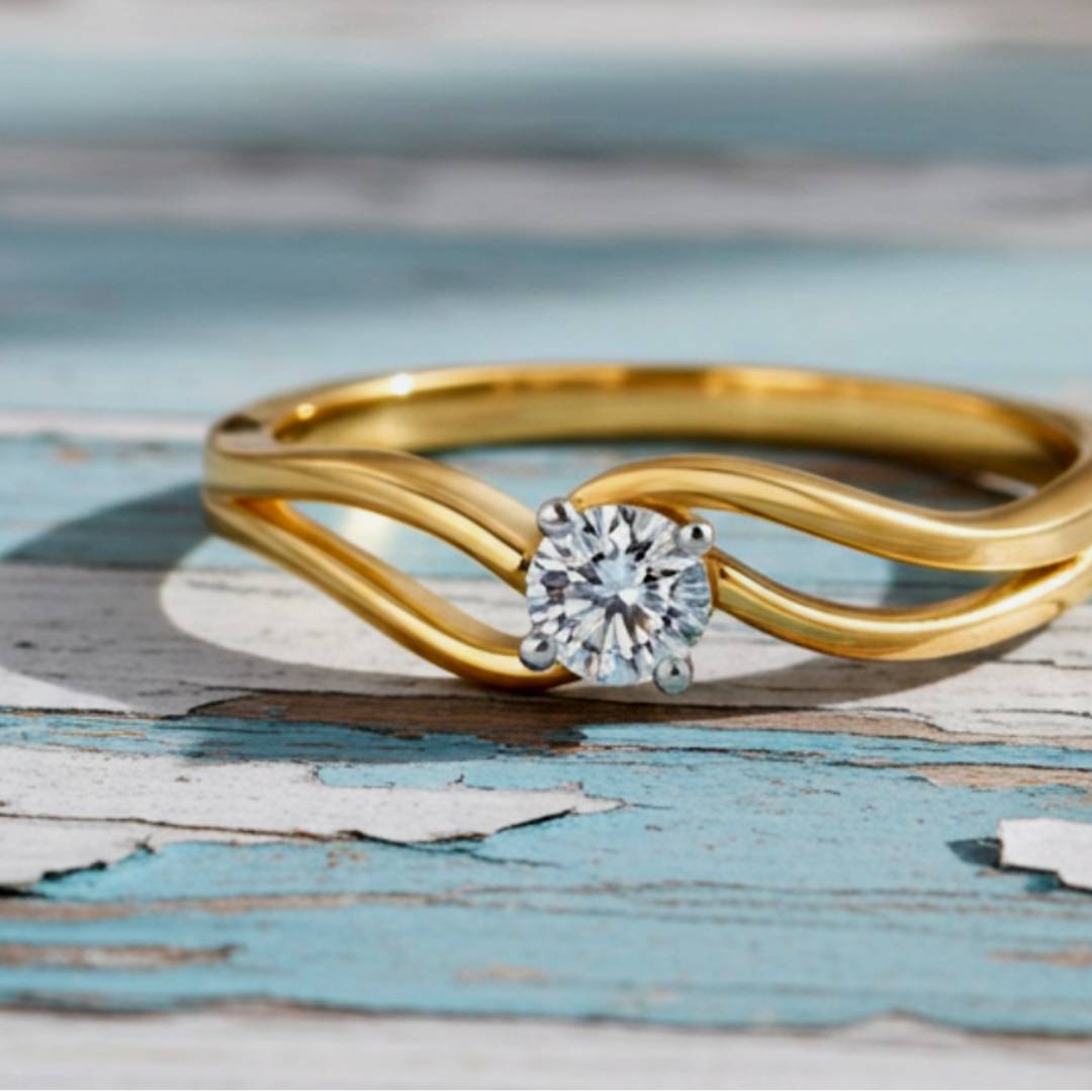 Gold ring with a diamond on a textured blue surface