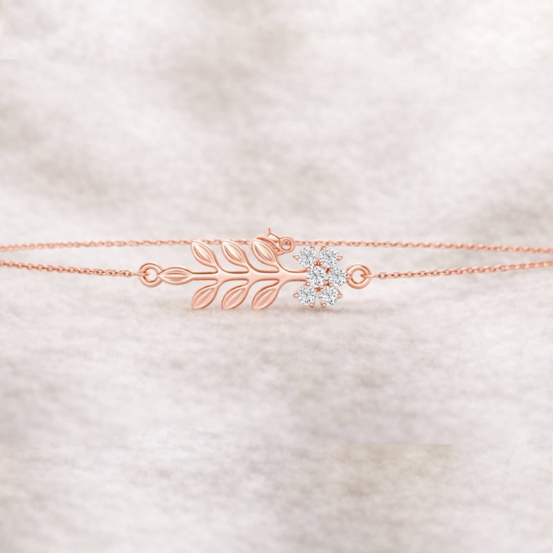 Rose gold bracelet with floral design on a soft white background