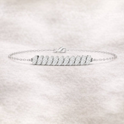 bracelet with leaf-shaped charms on a light gray background
