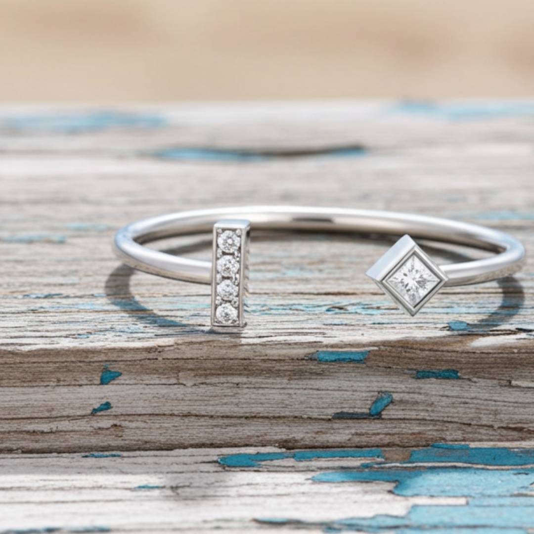 ring with diamond accents on a wooden surface