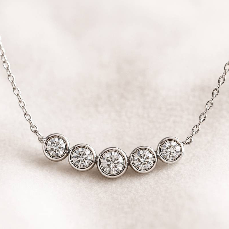 Diamond necklace on a light pink background