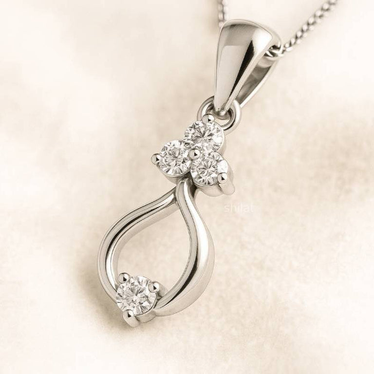  pendant with diamond accents on a beige background