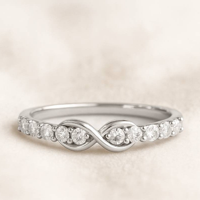 ring with diamond accents on a light beige background