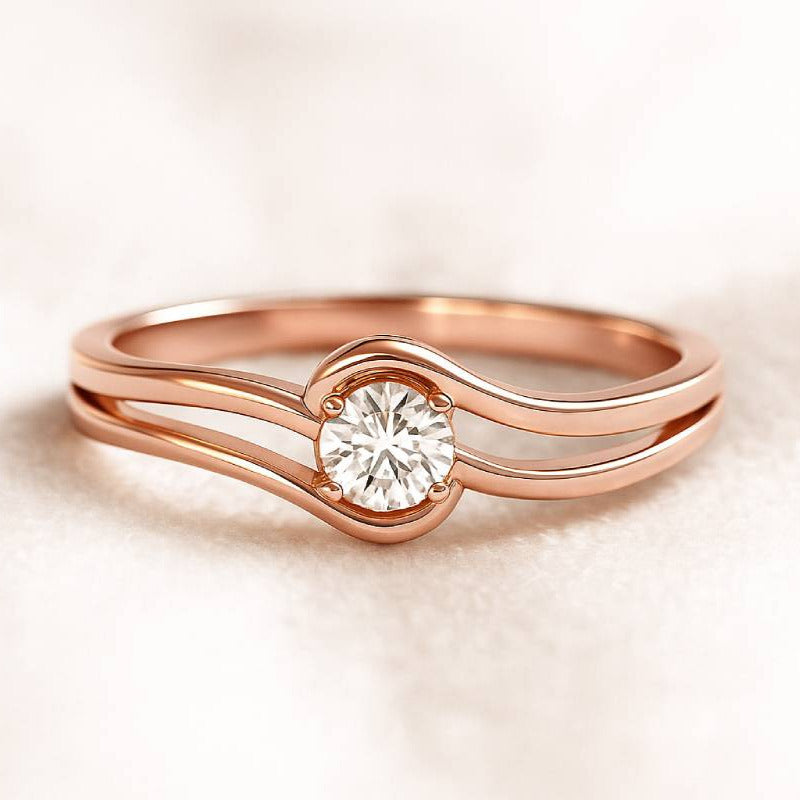 Rose gold ring with a diamond on a soft beige background