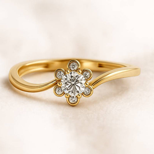 Gold ring with a diamond on a beige background