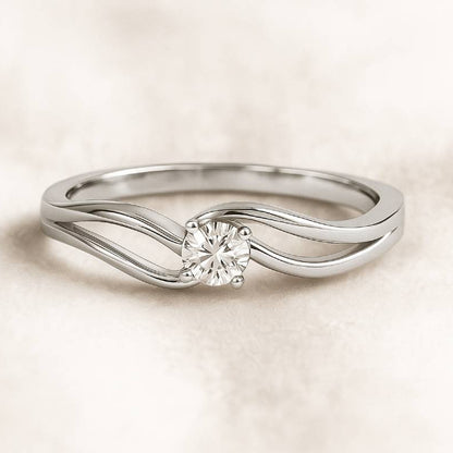  ring with a diamond on a beige background