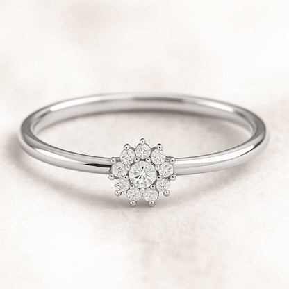  ring with a floral diamond design on a light background