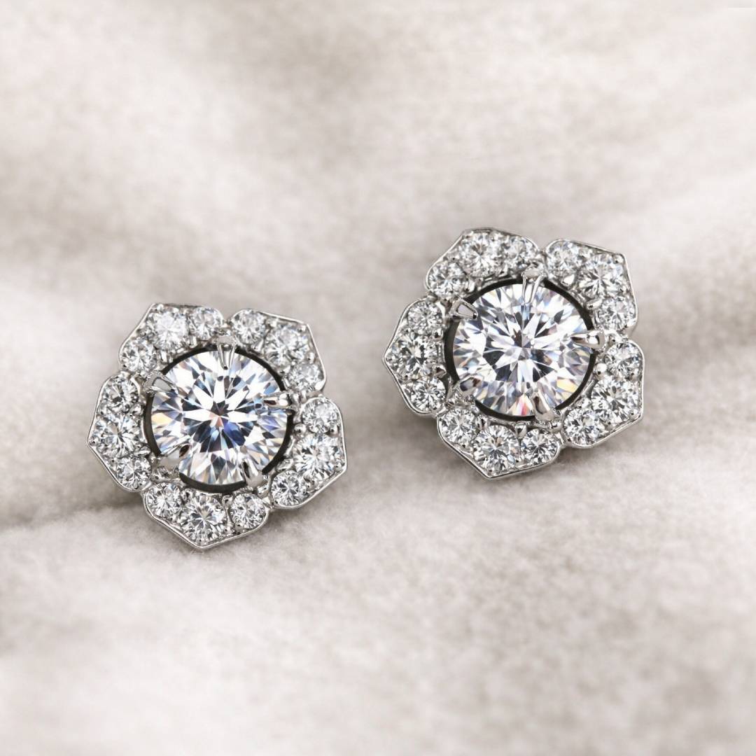 Pair of diamond earrings on a light background