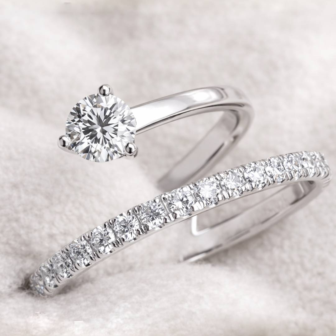 Two diamond rings on a light background