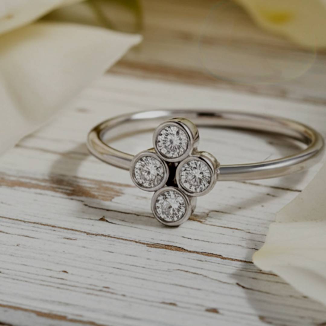  ring with diamond-like stones on a wooden surface