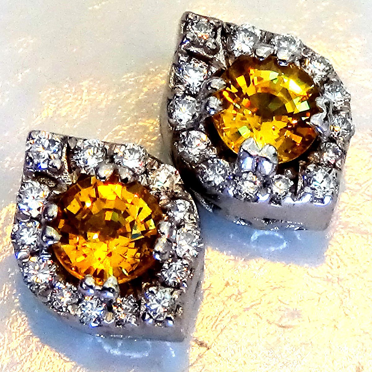 Orange sapphire and accent diamonds stud earrings - Shilat